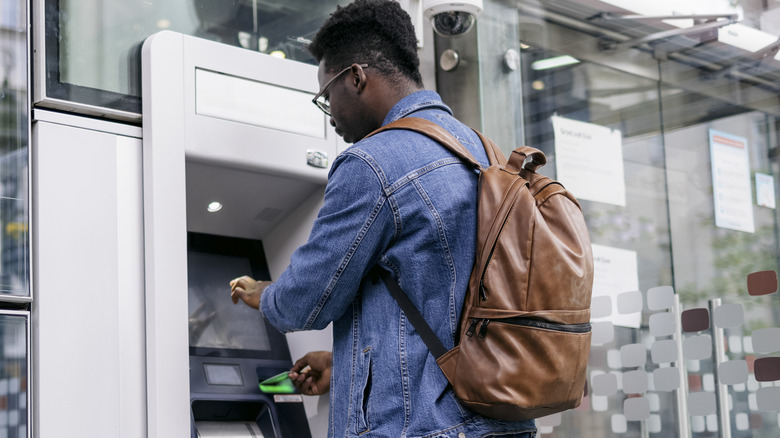 Person carrying out ATM transaction