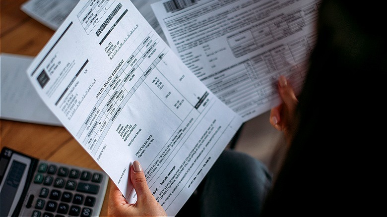 Person looking over financial records