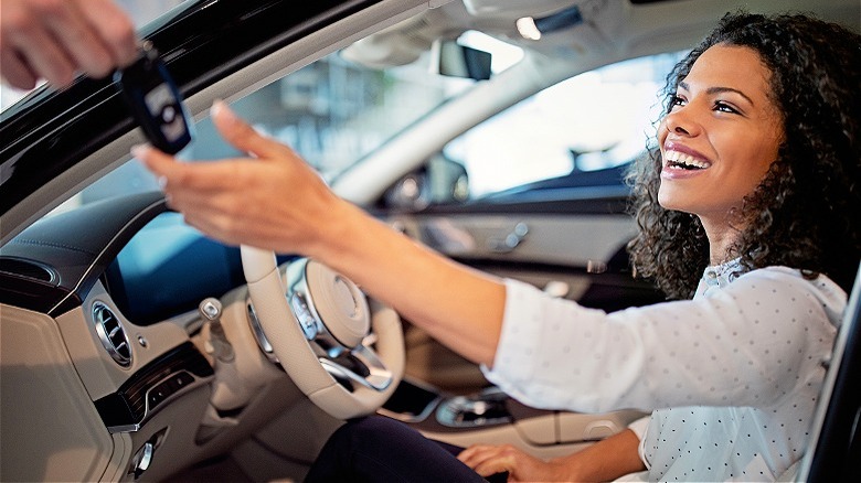 Person accepting rental car keys
