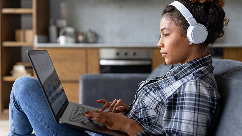 Person watching move on computer
