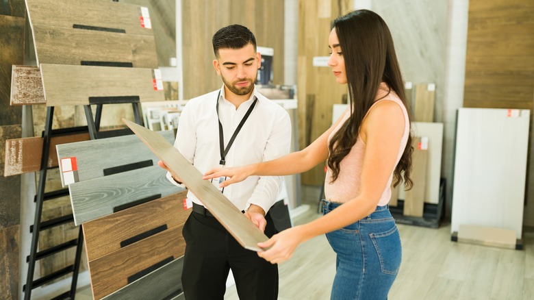 woman looking at flooring options