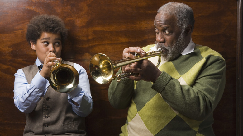two generations of trumpet players