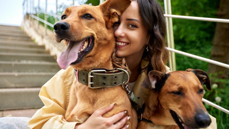 woman with two dogs