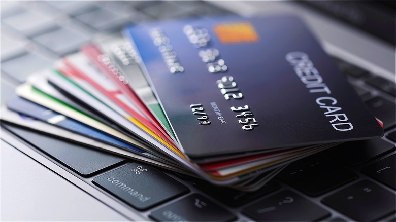 Credit cards on laptop keyboard