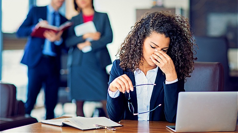 Person looking stressed at work