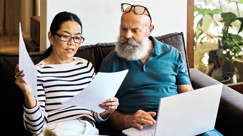Couple looking over paperwork