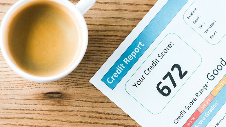 Credit score report and coffee