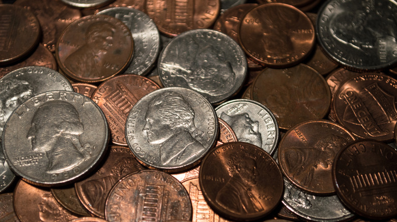 An assortment of U.S. dimes, nickels, pennies, and quarters