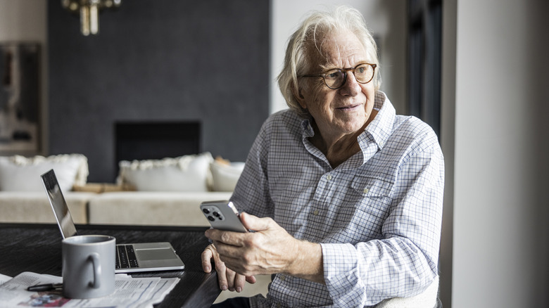 Elderly person on their phone