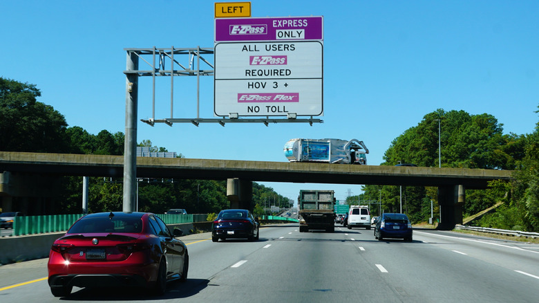 Overhead sign on a Virginia highway indicating designated express lane, requiring E-ZPass for all users