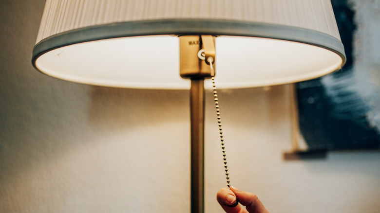 turning off a lamp