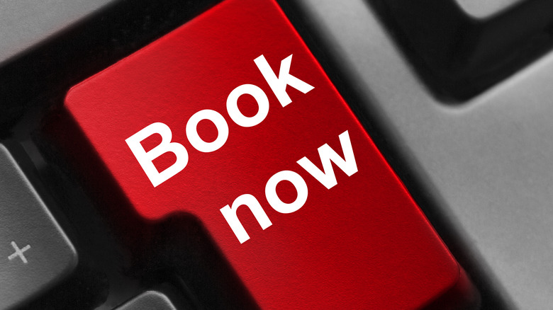 book now key on a computer keyboard