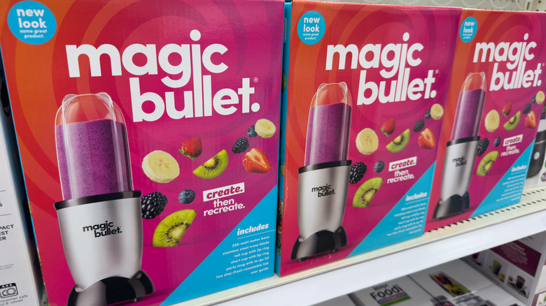 Magic bullet blenders in boxes on shelf in store