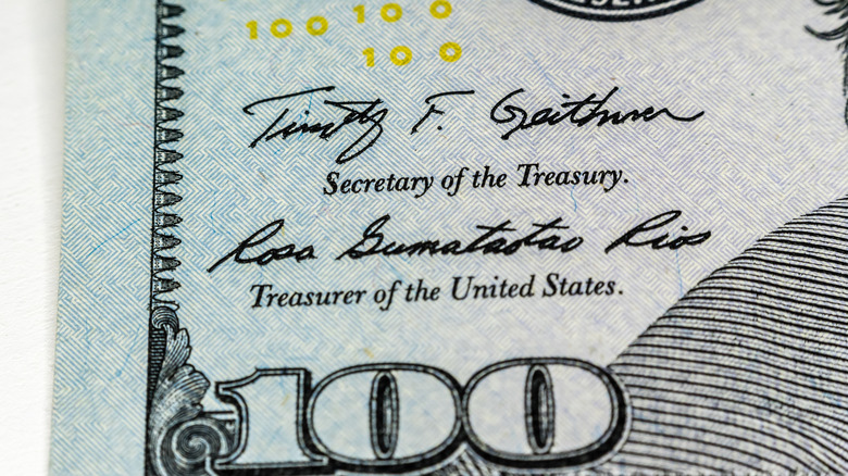 Signs of Treasury Secretary and Treasure on previous 100 dollar bill