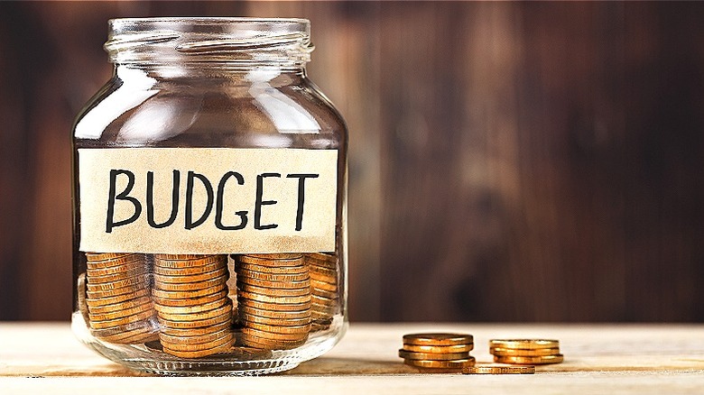gold coins in budget jar