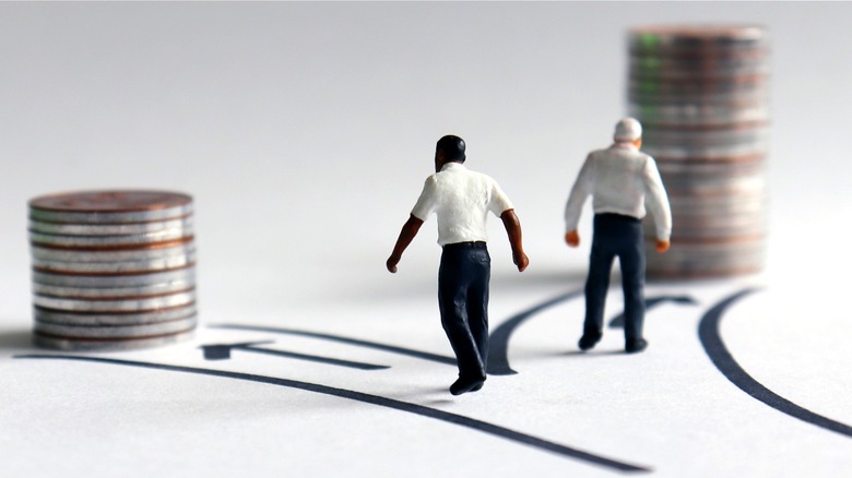 Miniatures showing racial wealth disparity