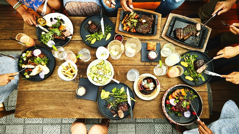 Restaurant table of people eating