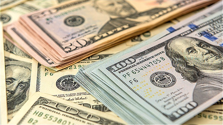 pile of different U.S. currency