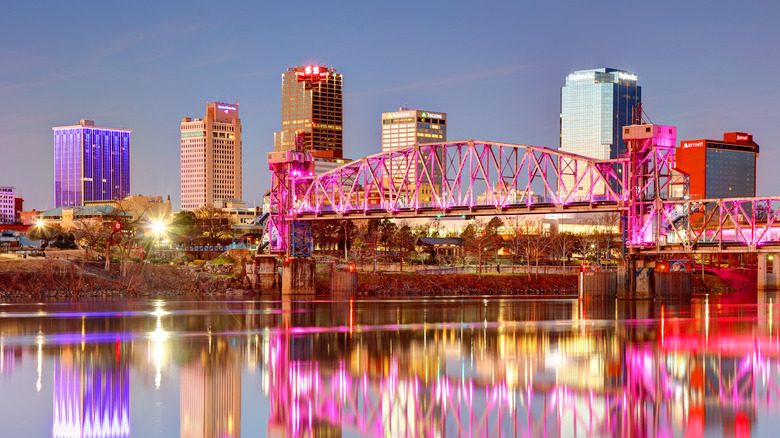 Little Rock, Arkansas skyline at night with shot of Arkansas River