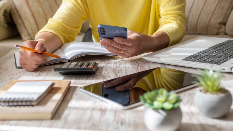 Woman organizing her finances and expenses