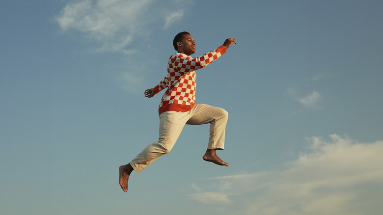 man jumping and flying through the air