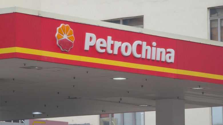 driver filling up car at a PetroChina station
