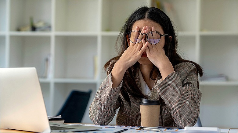 Concerned person working at computer