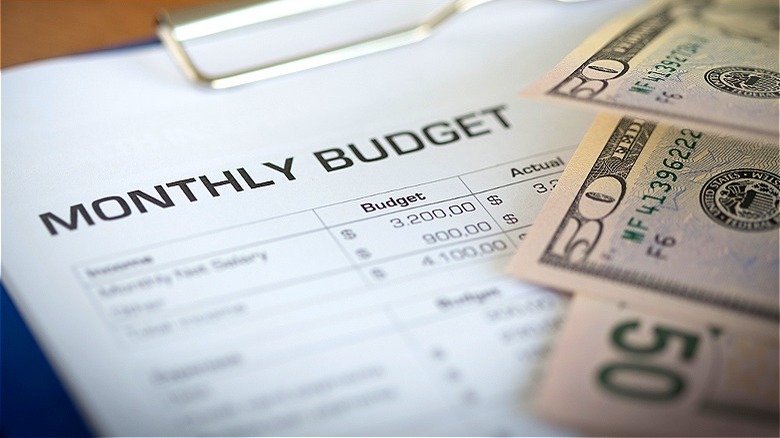 Filing out monthly budget sheet