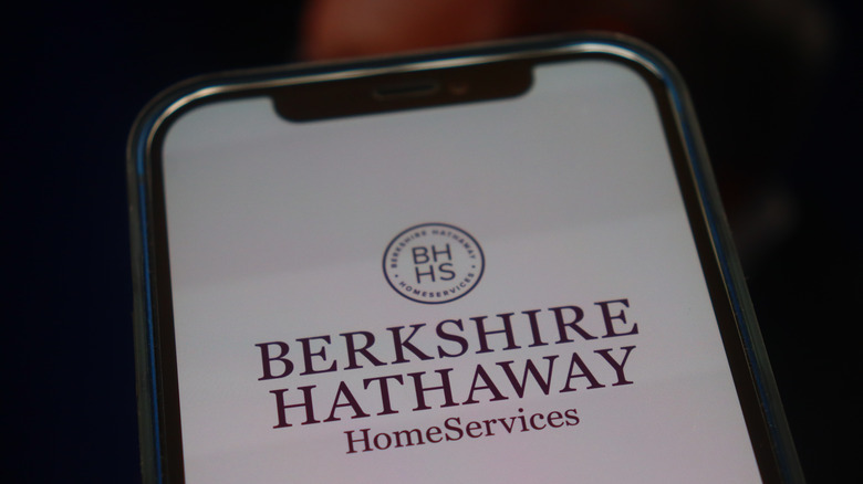 Logo of Berkshire Hathaway Home Services displayed on a smartphone screen