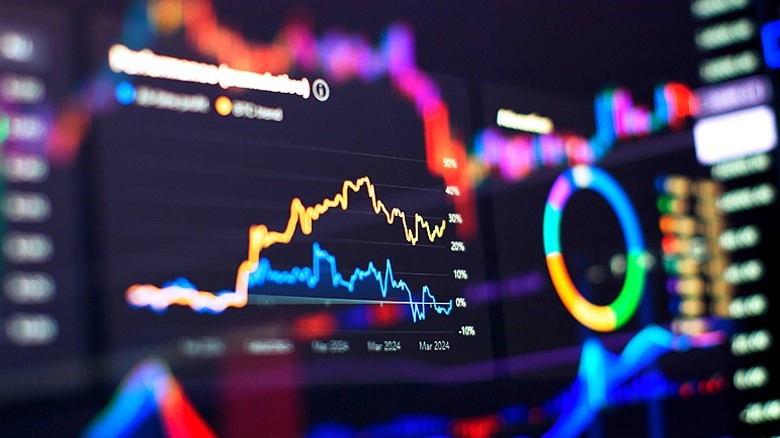 Out-of-focus investment charts and data