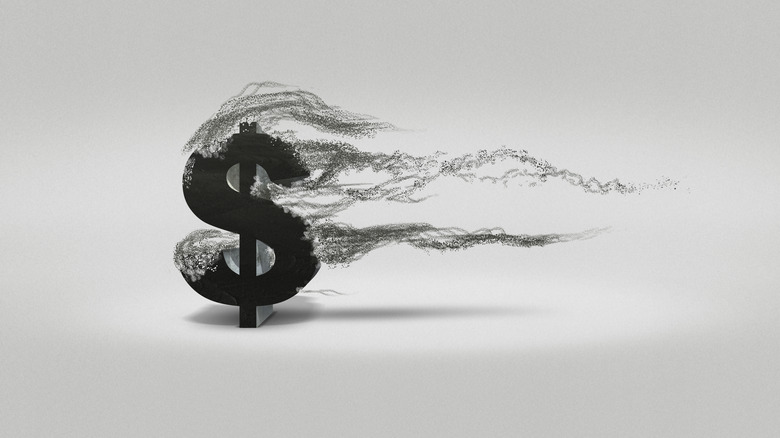 dollar sign blowing away
