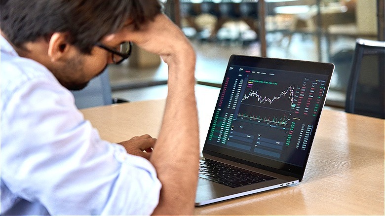 Depressed person trading stocks online