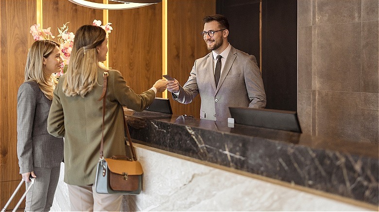 Guest checking in at hotel