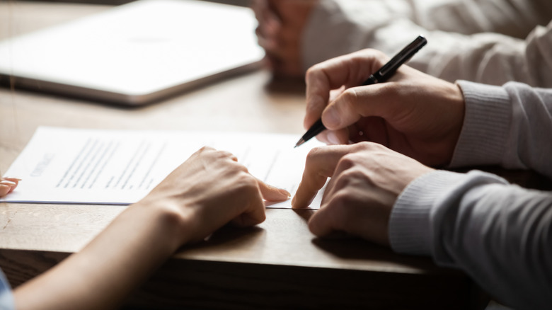Person filling in a form