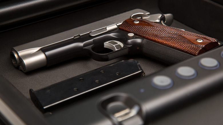 A handgun in a box