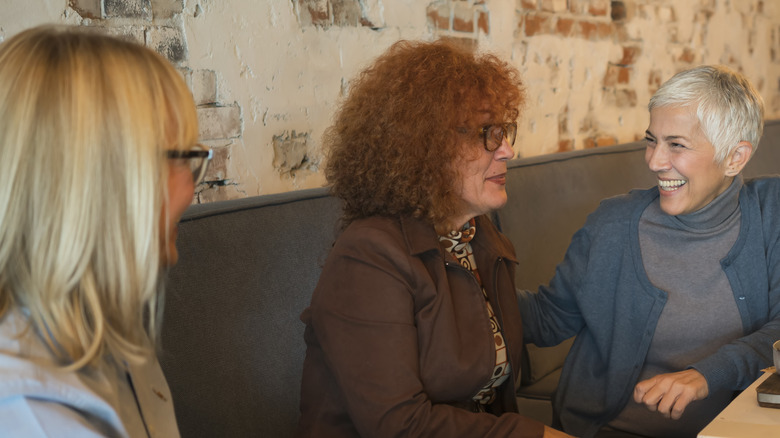 Mature women having lunch in a restaurant
