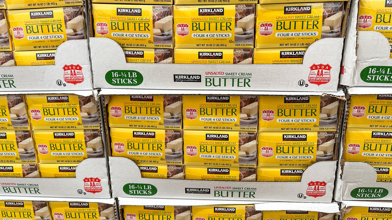 Packages of Kirkland unsalted sweet cream butter at a Costco store