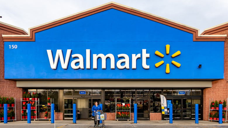 Walmart storefront with a shopper