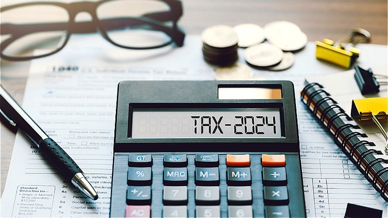 Tax paperwork and calculator