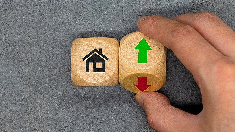 Wood blocks with house, arrows