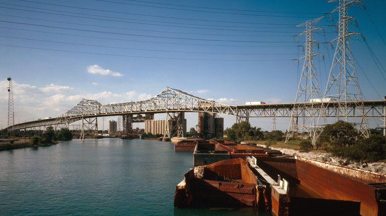 A sunny view of the Chicago Skyway Toll Bridge, with river
