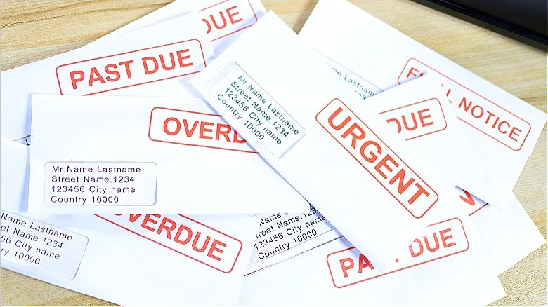 Stack of debt collection bills