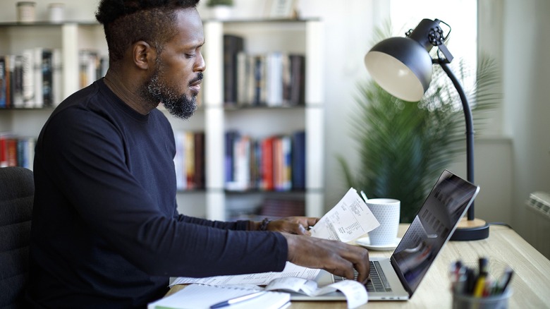 Person working through paperwork