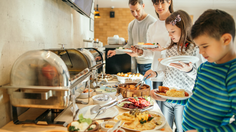 Family at breakfast buffet