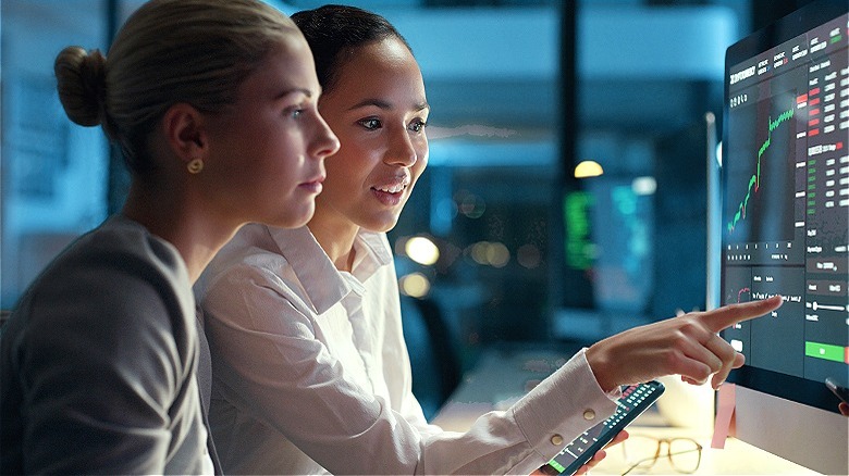 Two bitcoin traders working late