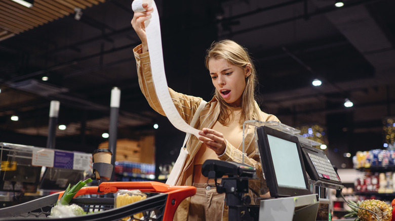 woman shocked at grocery bill