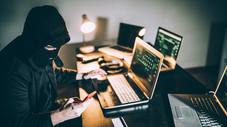 cyber criminal at computer