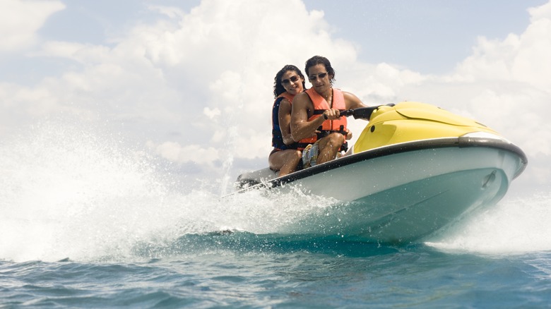 couple jetskiing