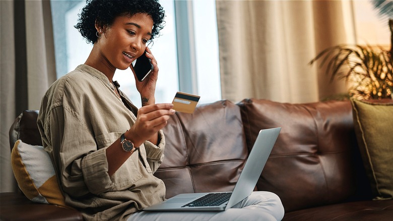 Phone call, holding credit card