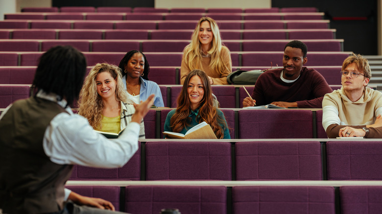 university professor and students in lecture hall